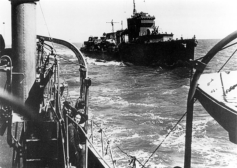 HMS Valentine escorting French troop carriers on 11 May 1940