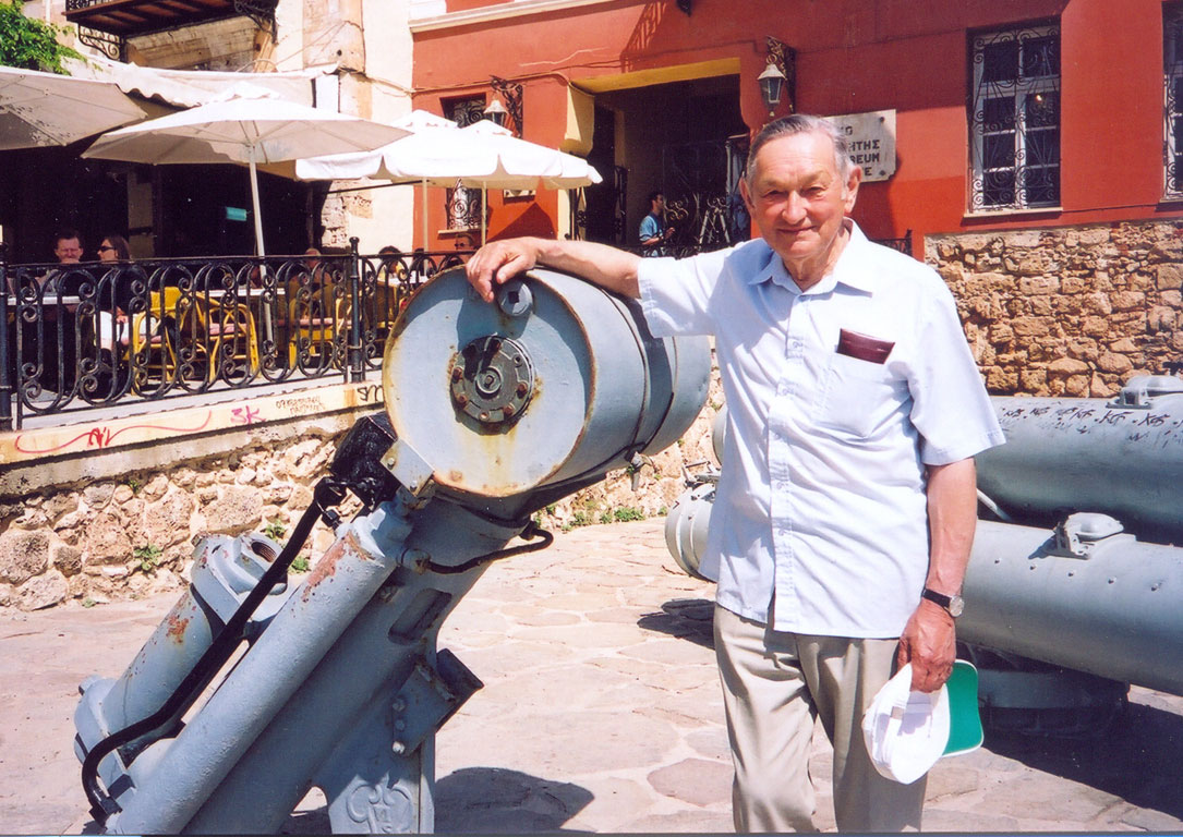 Alan Marsh at Chania, Crete with depth charge thrower and triple torpedo tubes