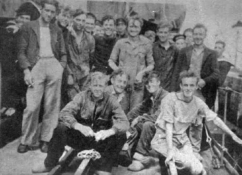 Survivors on deck of HMS Versatile