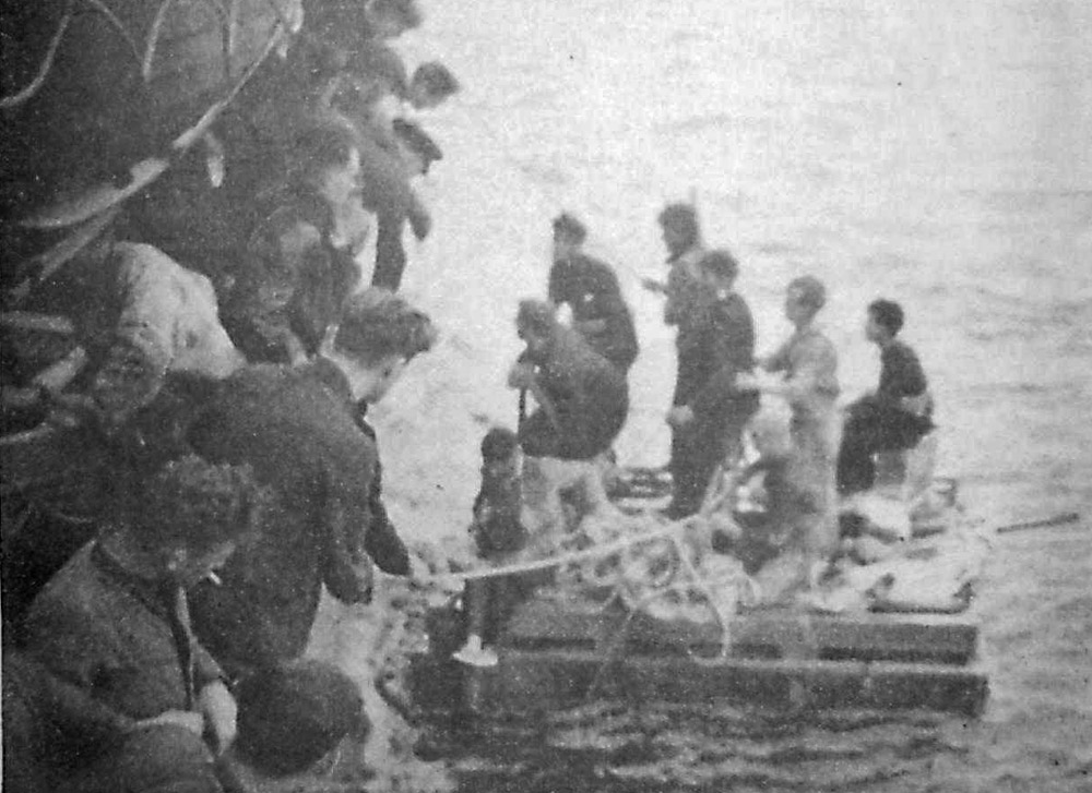 Survivors in life raft alongside HMS Versatile