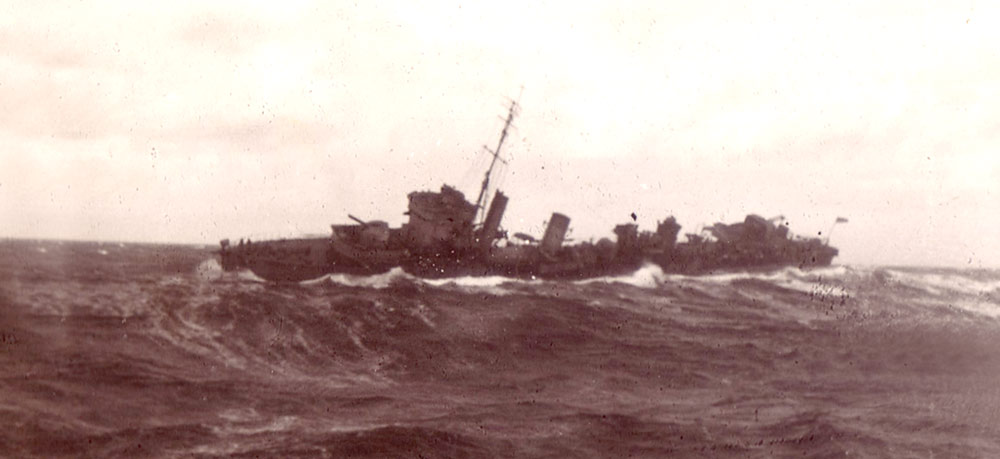 HMS Vimiera escorting an East Coasdt Convoy in rough seas