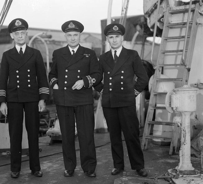Lt Cdr Stannard with his two brothers, both officers in the Merchant Navyy.