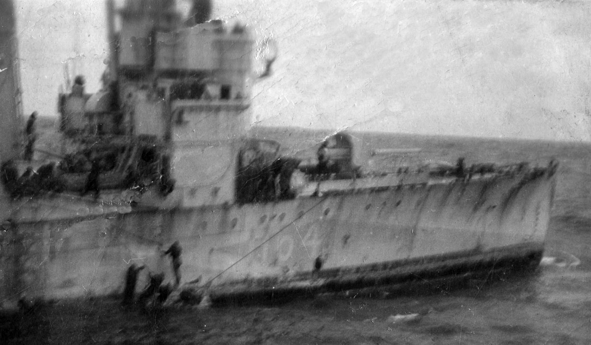 Survivors from U-187 in the water alongside HMS Beverley