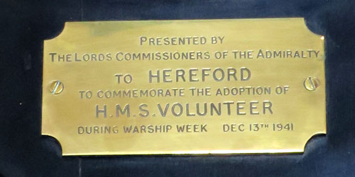 Inscribed plate recoeding tghe adoption of HMS Volunteer by Hereford