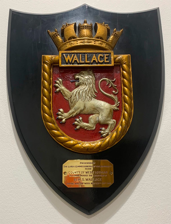 Crest of HMS Wallace on the shield presented by the Admiralty to West Lothian