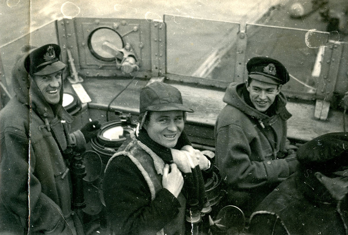 Lt Cdr G.C. Crowley with officers on bridge of Walpole