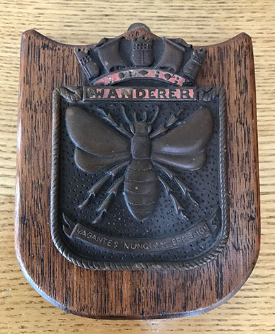 Bakelite badge of the cest of HMS Wanderer by LS Harry H Walker