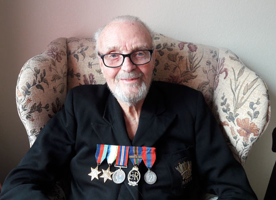 Ken Holmes photographed by his daughter, Annie Holmes, in his armchair on Tuesdsay 21 July 2020