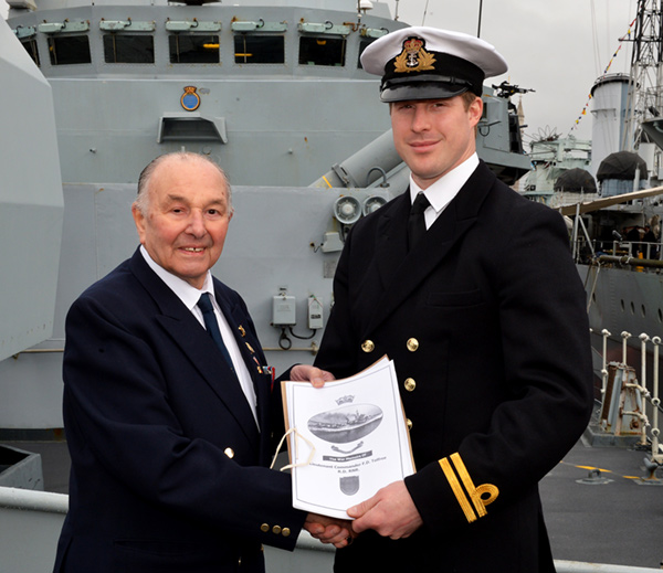 Eric Brett presents Derek Tolfree's Diary to HMS Westminster