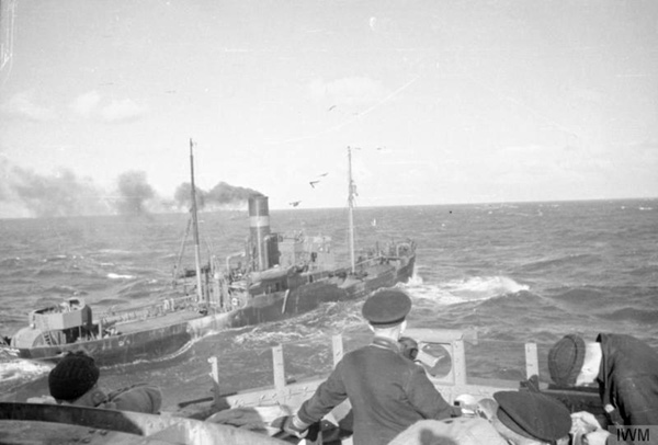 Lt Cdr Ouvry on the bridge of HMS WEstminster