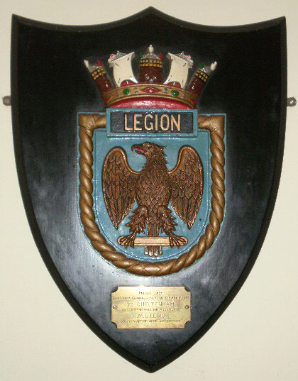 The wooden shield with the ship's crest of HMS Legion
