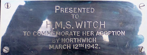 The inscribed plate on the plaque pressented to HMS Witch by Northwich