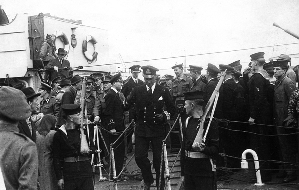 The CO goes ashore from HMS Woolston